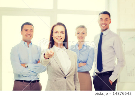 businesswoman in office pointing finger at you 14876642