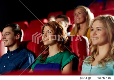 happy friends watching movie in theater 14876730