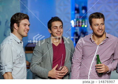 group of male friends with beer in nightclub group of male friends with beer in nightclub 14876907