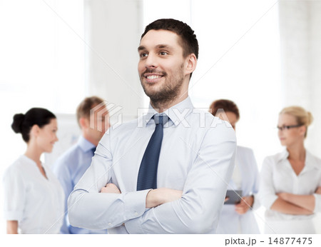 handsome businessman with crossed arms 14877475