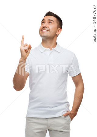 smiling man pointing finger up smiling man pointing finger up 14877637