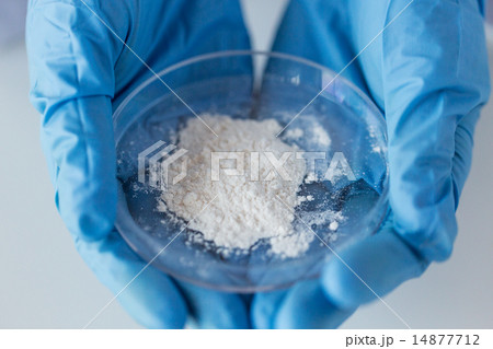 close up of scientist holding petri dish in lab close up of scientist holding petri dish in lab 14877712
