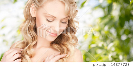 beautiful young woman face with long wavy hair 14877723
