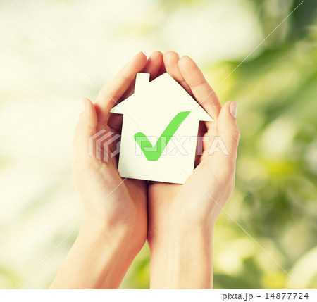 hands holding house with check mark 14877724
