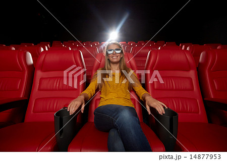 young woman watching movie in 3d theater young woman watching movie in 3d theater 14877953