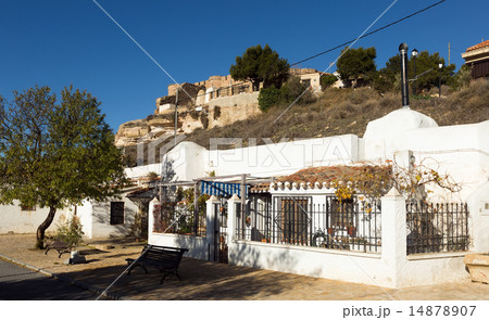 District with dwellings caves built into rock. Chinchilla 14878907