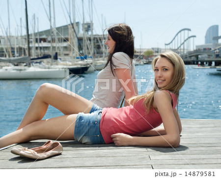Two happy in casual clothes sunbathing 14879581