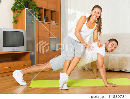 Healthy couple doing fitness Healthy couple doing fitness 14880784