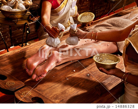 Woman having Ayurvedic feet spa massage. 14886328