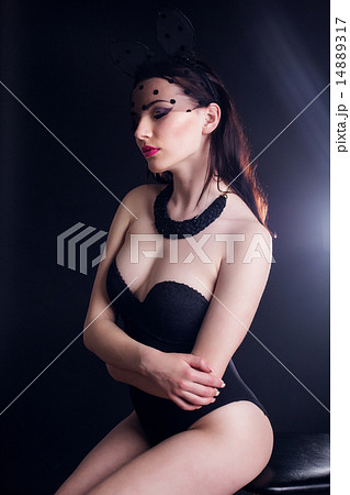 Sexy young lady in bunny ears mask and black body 14889317