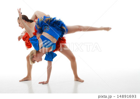 two women dance on a white background 14891693