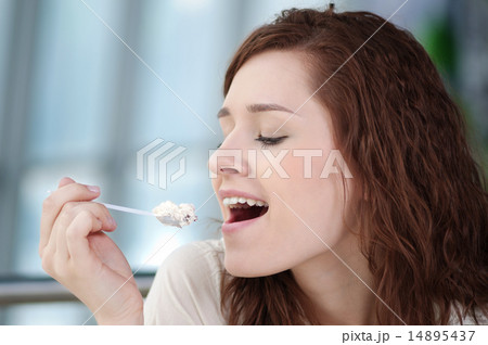 Young happy woman with cake Young happy woman with cake 14895437