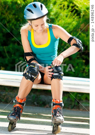 Young brunette woman on roller skates 14896246