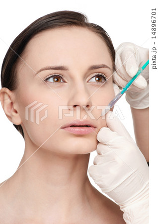 Cosmetic botox injection in the beauty face 14896701