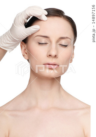 Beautician touch and exam health woman face. Beautician touch and exam health woman face. 14897156