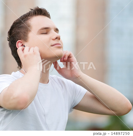 Young attractive man with headphones 14897250