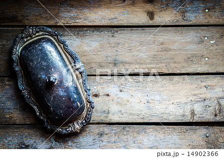 Vintage silver butter dish on wooden background 14902366
