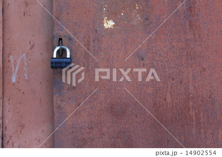 old iron door with lock 14902554