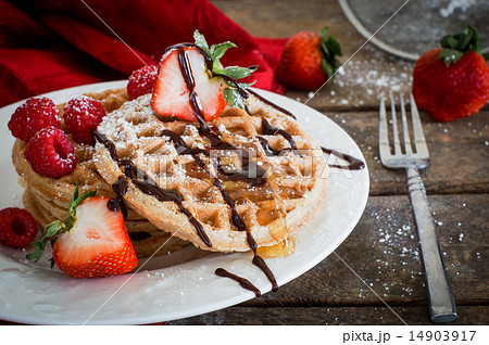 Waffles with strawberries on wooden background Waffles with strawberries on wooden background 14903917