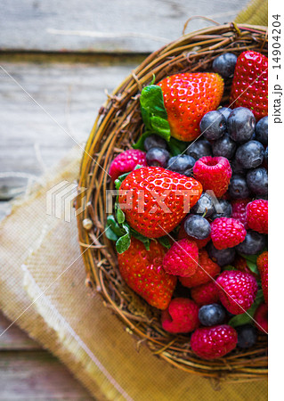 Berries on wooden background Berries on wooden background 14904204
