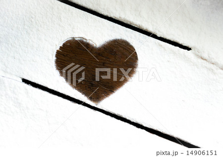 Wooden heart on the flour 14906151