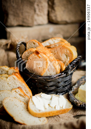 Sliced fresh bread on wooden background,vintage 14906337