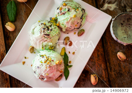Pistachio ice-cream on wooden background 14906972