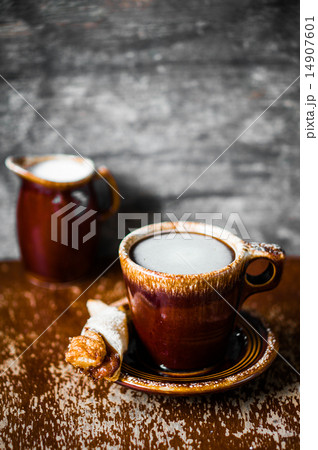 Rustic mug of coffee on wooden background 14907601