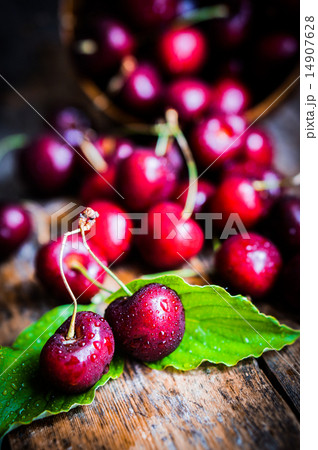 Cherries on rustic wooden background 14907628