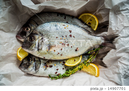 Fresh sea bream on wooden board 14907701