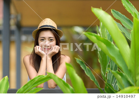 Woman putting hands on both side of her face Woman putting hands on both side of her face 14910497