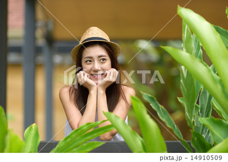Woman putting hands on both side of her face Woman putting hands on both side of her face 14910509