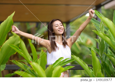 Young Chinese woman feeling refreshed Young Chinese woman feeling refreshed 14910977