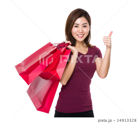 Woman hold with shopping bag and thumb up 14913328