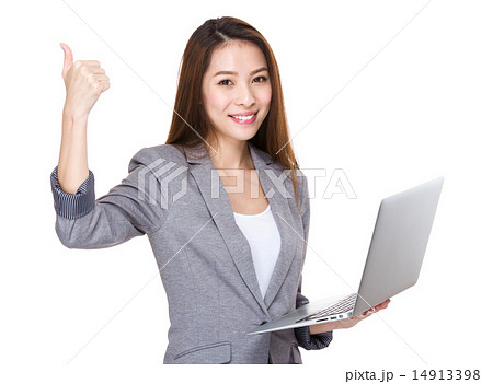 Businesswoman use of laptop and thumb up Businesswoman use of laptop and thumb up 14913398