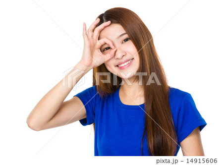 Woman with ok gesture on eye 14915606