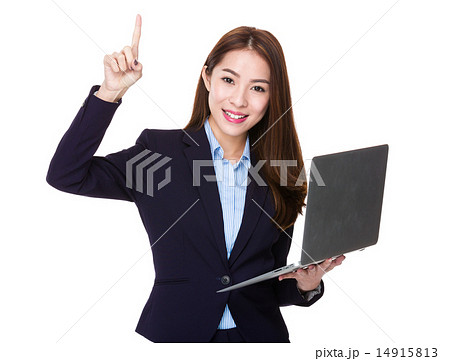 Businesswoman use of laptop and finger point up 14915813
