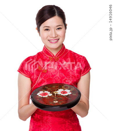 Chinese woman hold with traiditional snack tray Chinese woman hold with traiditional snack tray 14916046
