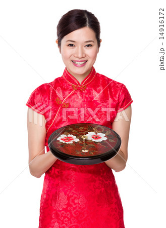 Chinese woman hold with snack tray Chinese woman hold with snack tray 14916172