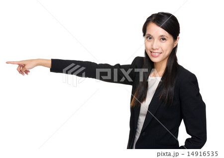Business woman pointing aside 14916535