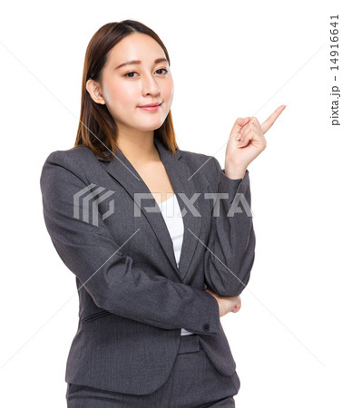 Business woman with finger point aside 14916641