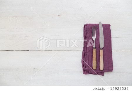 Silverware on a light wood 14922582