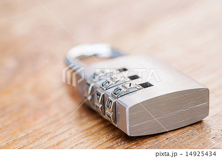 Combination padlock close up with chrome numbers  14925434