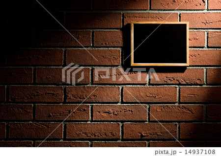 blank blackboard hanging on brick wall blank blackboard hanging on brick wall 14937108