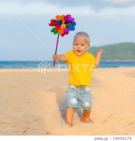 Baby with toy windmill Baby with toy windmill 14939174