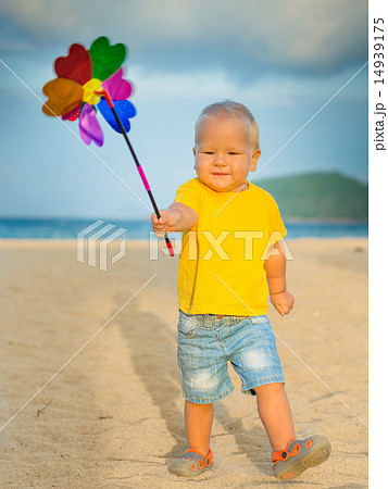 Baby with toy windmill Baby with toy windmill 14939175