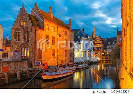 Picturesque night canal Dijver in Bruges 14946807