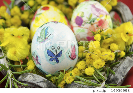 hand painted decoupage Easter egg in a basket 14956998