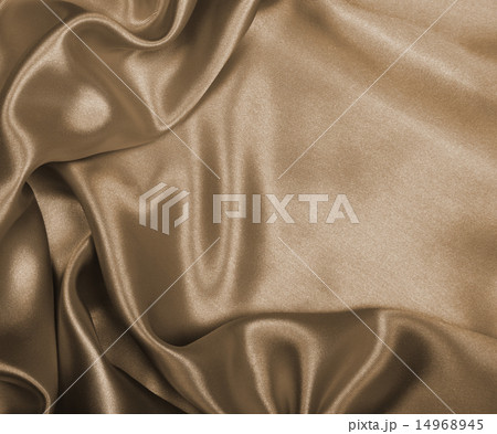 Smooth elegant golden silk or satin as background. Smooth elegant golden silk or satin as background. 14968945