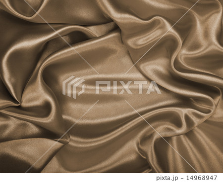 Smooth elegant golden silk or satin as background. 14968947